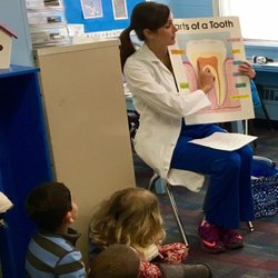 Dr. Jessica Clark teaching preschoolers about Dental Health.