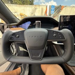 B&H Auto Trim & Upholstery - 2021 model s steering wheel wrap