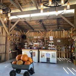 Pinhook Pumpkins - They have a Craft Barn with handmade crafts, goat milk soaps, beeswax candles, and even wood earrings for sale.