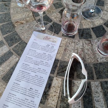 Avio Vineyards - a menu and glasses on a table - Wineries Near Me - Sutter Creek, California Avio Vineyards - a menu and glasses on a table - Wineries Near Me - Sutter Creek, California