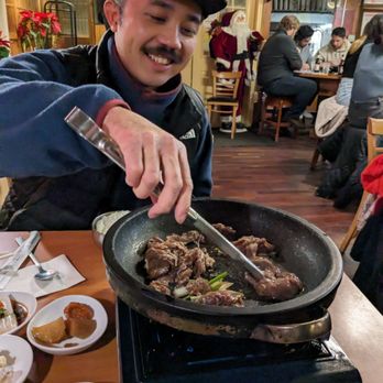 Cho Sun Ok Restaurant - Tim cooking bulgogi - Korean Near Me - Chicago, Illinois