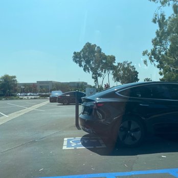 Tesla Supercharger - There were at least 6 cars behind me waiting. watch out for people trying to cut in with no disregard of others - EV Charging Stations Near Me - Cerritos, California