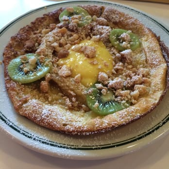 Milktooth - Baby dutch pancake with lon mango curd, kiwi, and cashews. Delicious!! - Breakfast & Brunch Near Me - Indianapolis, Indiana Milktooth - Baby dutch pancake with lon mango curd, kiwi, and cashews. Delicious!! - Breakfast & Brunch Near Me - Indianapolis, Indiana