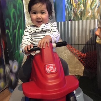 Twinkle Playspace - Riding down the mini coaster! - Recreation Centers Near Me - Brooklyn, New York