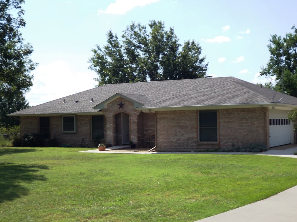 Slide of Quality Tops Roofing