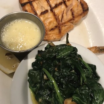 Damon's Steak House - Salmon meal with garlic spinach - Steakhouses Near Me - Glendale, California