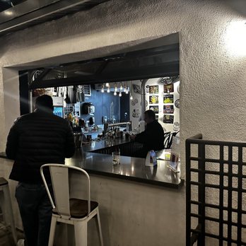 Voodoo Brewing - Service window from the outdoor space to the bartender so you don't have to go back inside! - Breweries Near Me - Las Vegas, Nevada
