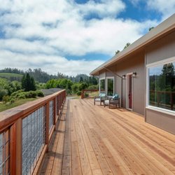 Nordic Contractors - Wrap around deck addition with hog wire to look at beautiful views