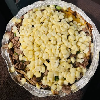 Papas El Guero - Asada potato with butter, sour cream, cheese, jalapeños, chives, and corn. - Food Stands Near Me - Perris, California
