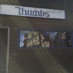 Thumbs - West Street entry, parking in front and back