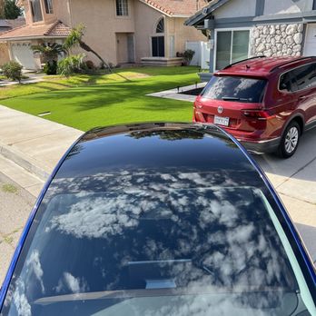 M M Window Tint Mobile - Roof of Tesla Model Y - Car Window Tinting Near Me M M Window Tint Mobile - Roof of Tesla Model Y - Car Window Tinting Near Me