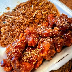 New China Express - C07 Sesame Chicken ($10.35). Don't be fooled by the presentation. The chicken is overfried and the rice is bland.