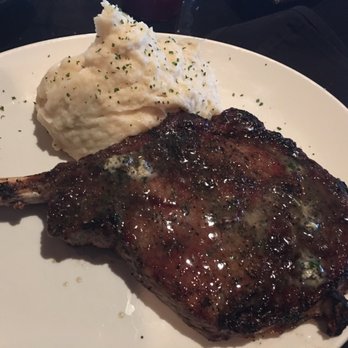 Stoney River - 42 oz. Cowboy ribeye cooked medium with garlic mashed - Steakhouses Near Me - Roswell, Georgia Stoney River - 42 oz. Cowboy ribeye cooked medium with garlic mashed - Steakhouses Near Me - Roswell, Georgia