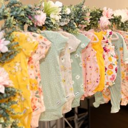 Dream Designs By Sherlly - On our last minute request Sherry helped us build a rack with flowers to hand clothes