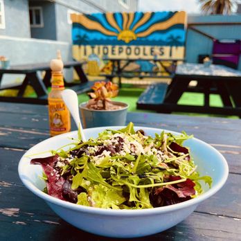 TidePoole's - Zeus' Greens Salad on the back patio - Breakfast & Brunch Near Me - Newport Beach, California