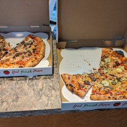 Mulberry Station Brewing Company - A couple pies. Classic Sausage on the left and Italian garden pizza on the right.