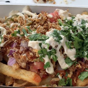 Rick's Good Eats - Butter Chicken Loaded Masala Fries. Insane! - Indian Near Me - Mississauga, Ontario Rick's Good Eats - Butter Chicken Loaded Masala Fries. Insane! - Indian Near Me - Mississauga, Ontario