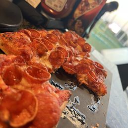 Pepperoni pizza with hot honey drizzle before it disappeared