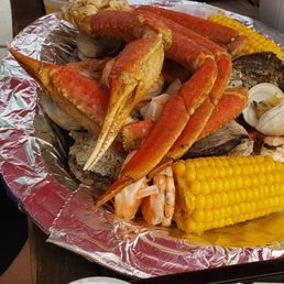 The teens Seafood Medley was out of this world!  Oysters crab legs, shrimp, clams, sausage, corn on the cob. He was in heaven