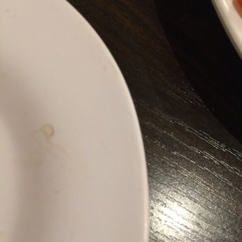 Pho 21 - Dry looking coffee stain on a plate!  Waitress bought me a bowl w/ something dried up in it...she picked it out and give me the bowl... - Vietnamese Near Me - Buena Park, California