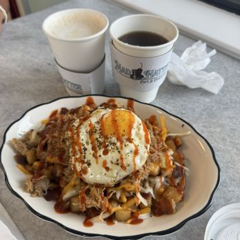 Mad Hatter Cafe & Confections - Mad Hatter Hash (or something like that). Delicious potatoes, brisket, cheese, and sirracha. - Desserts Near Me - Warner Robins, Georgia