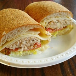 A delicious tuna sub with provelone, LTO & hot peppers... splitting it is a must.