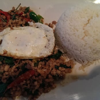 Elephant Thai Kitchen - Spicy chicken with basil topped with a fried egg and white rice. - Thai Near Me - Long Beach, California Elephant Thai Kitchen - Spicy chicken with basil topped with a fried egg and white rice. - Thai Near Me - Long Beach, California