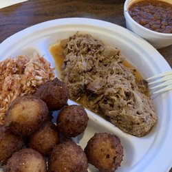 Porky's Bar B Que - BBQ pork & slaw, hush puppies and baked beans