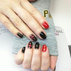 Envy Nail Bar - Swarovski Crystals and gel polish over natural nails.