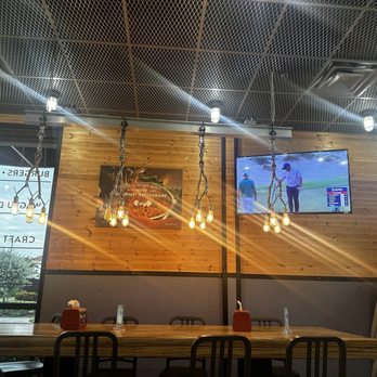 BurgerFi - Seating with TVs & Golf is on - Burgers Near Me - Boynton Beach, Florida BurgerFi - Seating with TVs & Golf is on - Burgers Near Me - Boynton Beach, Florida