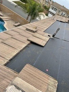 Flat concrete Tile roof leak repair - Roofirst Roofing Systems will install two layers of #30 Fontana asphaltic underlayment felt and put the tiles back in place. Followed by the seal gaps between vent pipes and flashing with polyurethane silicon. This assures longer lasting results for your roofing needs. Flat concrete Tile roof leak repair - Roofirst Roofing Systems will install two layers of #30 Fontana asphaltic underlayment felt and put the tiles back in place. Followed by the seal gaps between vent pipes and flashing with polyurethane silicon. This assures longer lasting results for your roofing needs.