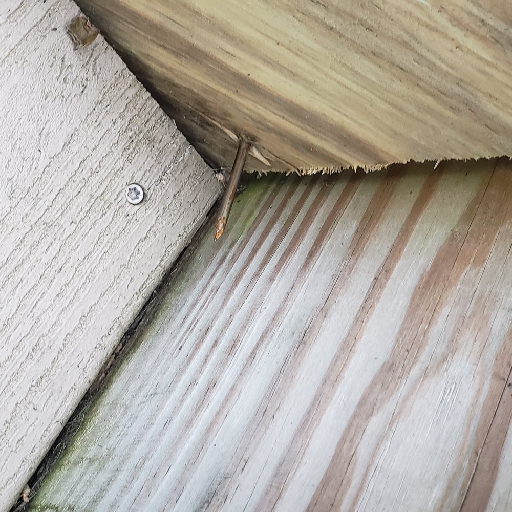 Roys Home Improvements - Stairs_Nail sticking out on first stair. No other nail connecting stringer to stair on this step... at all! - Handyman Near Me