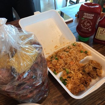 Swamp City - Fried oysters with Cajun rice and crawfish with corn, sausages and potatoes. - Cajun/Creole Near Me - Houston, Texas Swamp City - Fried oysters with Cajun rice and crawfish with corn, sausages and potatoes. - Cajun/Creole Near Me - Houston, Texas