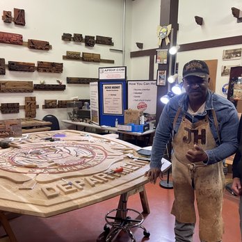 Olvera Street - Hand carved Fire Department sign by Jackie Hadnot. - Local Flavor Near Me - Los Angeles, California