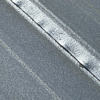 Roof Doctors Metal Roofs by Bihlear Construction - a closeup of the asphalt - General Contractors Near Me - Moncks Corner, South Carolina Roof Doctors Metal Roofs by Bihlear Construction - a closeup of the asphalt - General Contractors Near Me - Moncks Corner, South Carolina