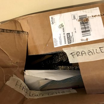 EZ Moving & Storage - Broken Fragile Box - Movers Near Me EZ Moving & Storage - Broken Fragile Box - Movers Near Me