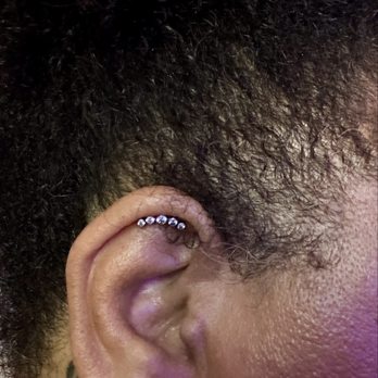 Rebel Rebel Body Piercing - Helix piercing with a curve earring. - Piercing Near Me - Anaheim, California