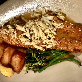 Clancy's Restaurant - Off the Boat fresh Redfish with Meunière Sauce topped with lump crabmeat. - Seafood Near Me - New Orleans, Louisiana