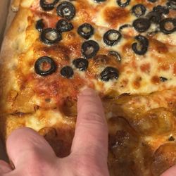 The cheese at this part is almost 1/2 way down. There's hardly any sauce. We paid over $30 for this! INSANE!