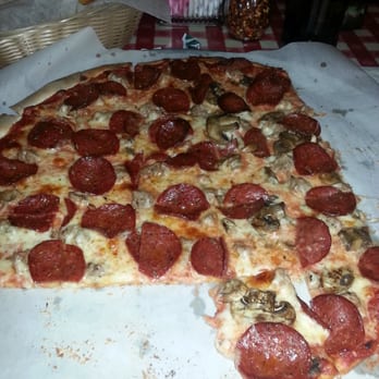 Mike & Angelo's - Thin crust sausage, pepperoni,  mushrooms on half - Pizza Near Me - Racine, Wisconsin