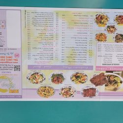 Ming Garden - New menu featuring price increases 6/22.  No idea why upside down!