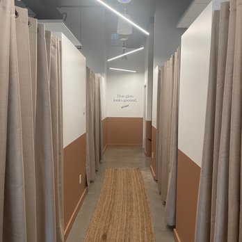 Heyday - Lowry - Hallway with individual rooms for facials - Day Spas Near Me - Denver, Colorado
