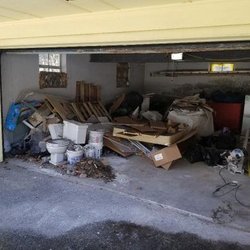 Smart Junkers - Before pic of a garage filled with debris.