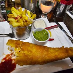 Clancy's Bar & Restaurant - Clancy's fish (codling) and chips with mushy green peas. A sizable portion to say the least.