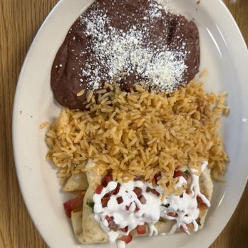 El Rinconcito de Logan - Chimichanga they forgot to deep fry served with uncle Ben's rice. - Latin American Near Me - Logan, Utah