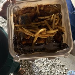 Not good at all just some Dino nuggets drenched in sauce with fries