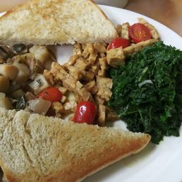 Vegan sourdough toast with side order of greens, potatoes, and maple temeph