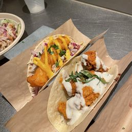 Spicy Tikka Chicken taco (right) and fish left