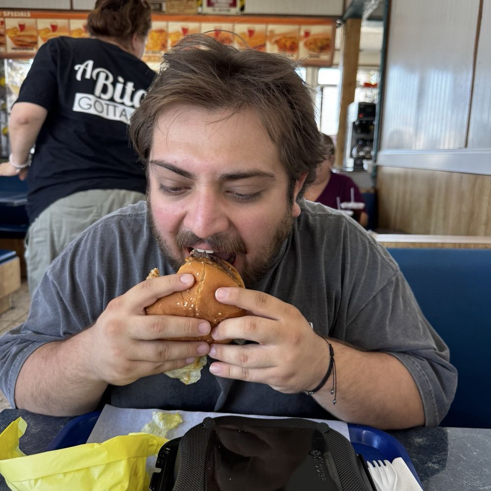Olympic Troy's Burgers - Our son Ferno Gorilla gripping his cheese burger. - Burgers Near Me - Bell Gardens, California