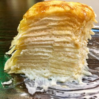 Lady M Cake Boutique - Close up of the layers of the Signature Mille Crepe. - Desserts Near Me - Arlington Heights, Illinois